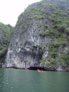 Double kayaks and wave cut platforms in Halong Bay 
